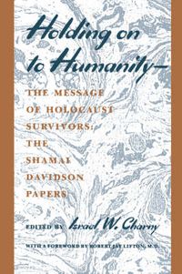 Cover image for Holding on to Humanity--The Message of Holocaust Survivors: The Shamai Davidson Papers