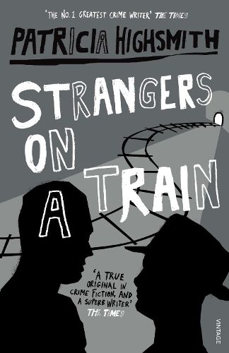 Cover image for Strangers on aTrain