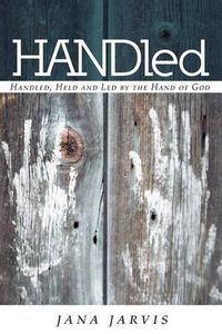 Cover image for HANDled: Handled, Held and Led by the Hand of God