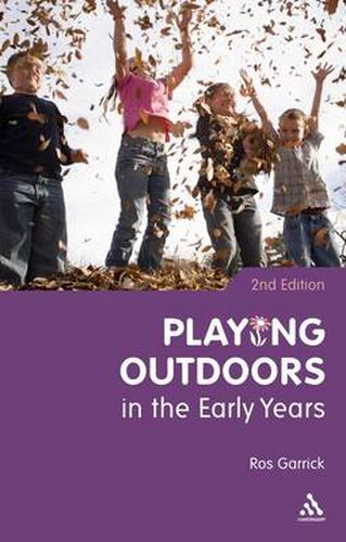 Cover image for Playing Outdoors in the Early Years