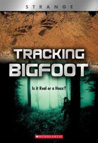 Cover image for Tracking Big Foot (Xbooks: Strange): Is It Real or a Hoax?