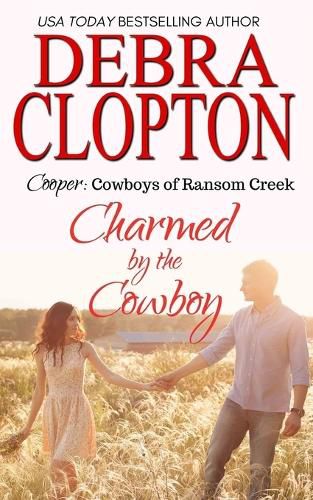 Cover image for Cooper: Charmed by the Cowboy