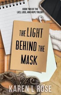 Cover image for The Light Behind the Mask