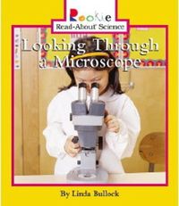 Cover image for Looking Through a Microscope