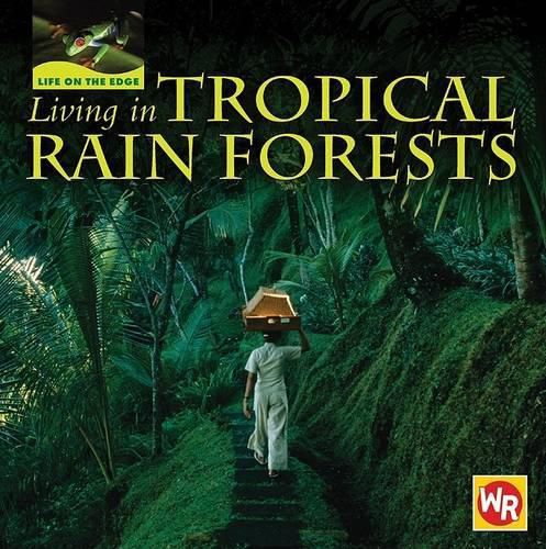 Cover image for Living in Tropical Rain Forests