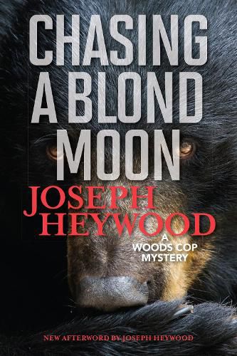 Cover image for Chasing a Blond Moon: A Woods Cop Mystery