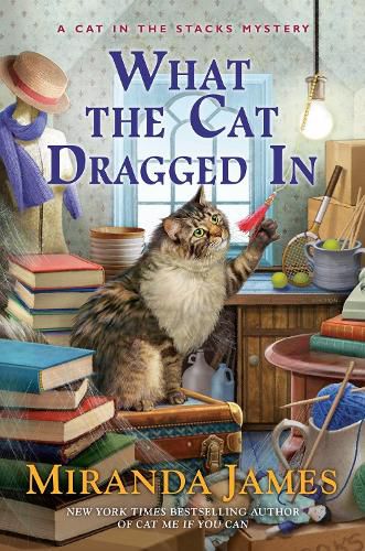 Cover image for What The Cat Dragged In