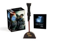 Cover image for Harry Potter Wizard's Wand with Sticker Book: Lights Up!