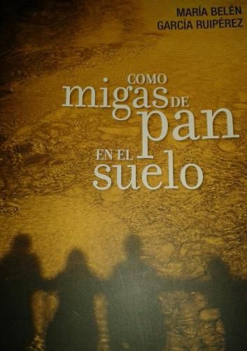 Cover image for Como migas de pan en el suelo