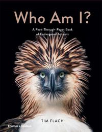 Cover image for Who Am I?: A Peek-Through-Pages Book of Endangered Animals