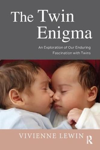 Cover image for The Twin Enigma: An Exploration of Our Enduring Fascination with Twins