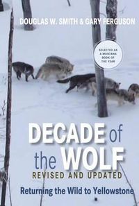 Cover image for Decade of the Wolf, Revised and Updated: Returning The Wild To Yellowstone