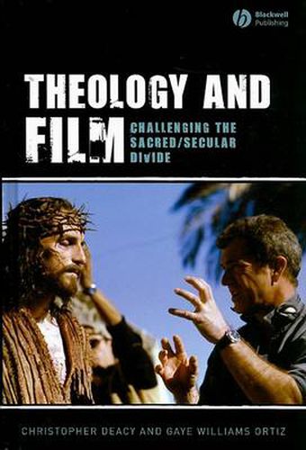 Cover image for Theology and Film: Challenging the Sacred/secular Divide