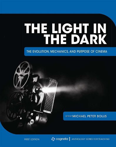 Cover image for The Light in the Dark: The Evolution, Mechanics, and Purpose of Cinema