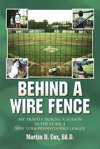 Cover image for Behind a Wire Fence