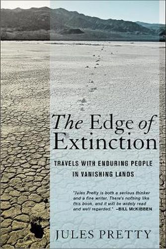 Cover image for The Edge of Extinction: Travels with Enduring People in Vanishing Lands