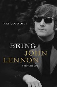 Cover image for Being John Lennon: A Restless Life