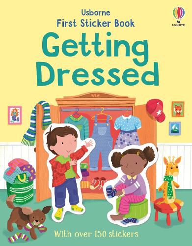 Cover image for First Sticker Book Getting Dressed