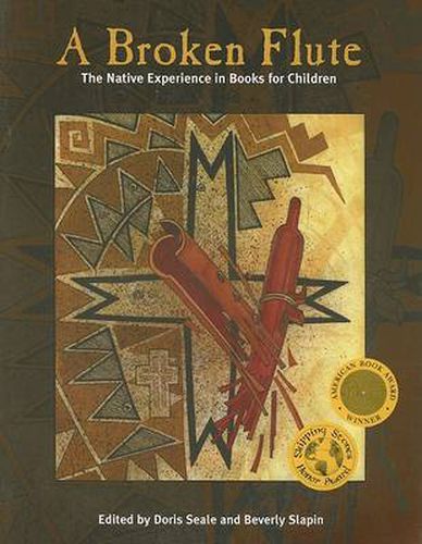 Cover image for A Broken Flute: The Native Experience in Books for Children