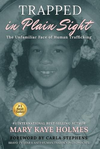 Cover image for Trapped in Plain Sight: The Unfamiliar Face of Human Trafficking