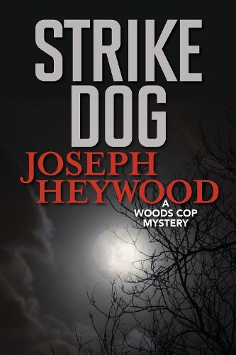 Cover image for Strike Dog: A Woods Cop Mystery