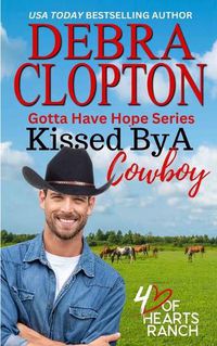 Cover image for Kissed By a Cowboy