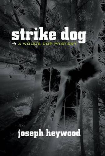 Cover image for Strike Dog: A Woods Cop Mystery