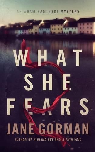 Cover image for What She Fears: Book 4 in the Adam Kaminski Mystery Series