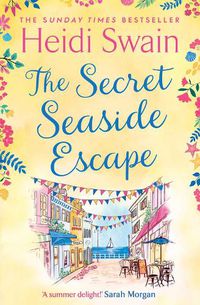 Cover image for The Secret Seaside Escape: Escape to the seaside with the most heart-warming, feel-good romance of 2020, from the Sunday Times bestseller!