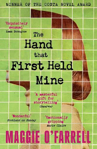 Cover image for The Hand That First Held Mine