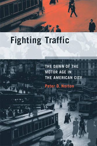 Cover image for Fighting Traffic: The Dawn of the Motor Age in the American City