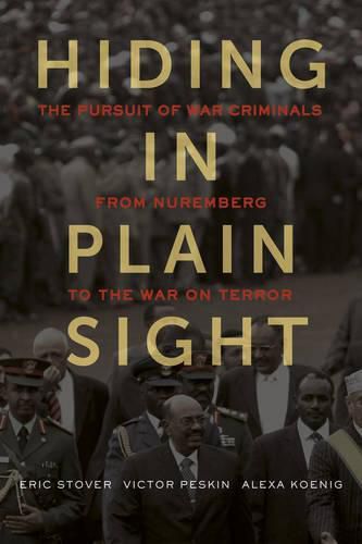 Cover image for Hiding in Plain Sight: The Pursuit of War Criminals from Nuremberg to the War on Terror