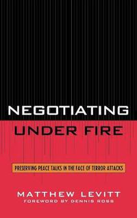 Cover image for Negotiating Under Fire: Preserving Peace Talks in the Face of Terror Attacks