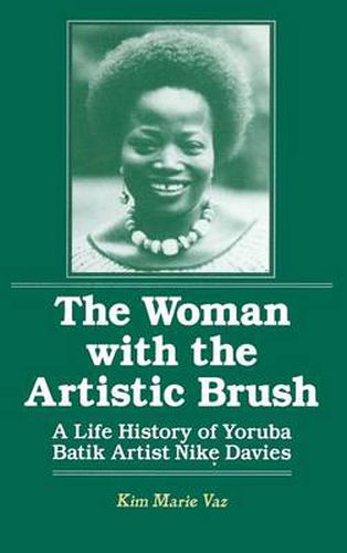 Cover image for The Woman with the Artistic Brush: Life History of Yoruba Batik Nike Olaniyi Davies