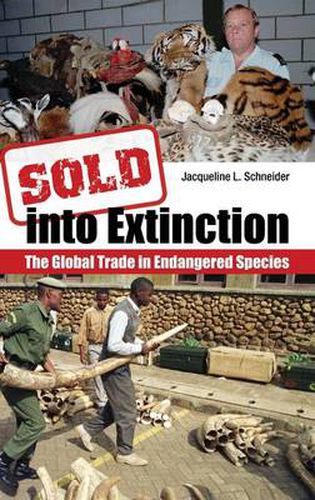 Cover image for Sold into Extinction: The Global Trade in Endangered Species