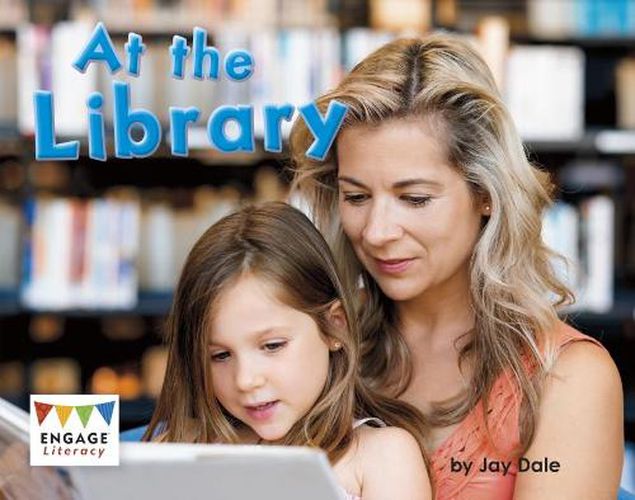 Cover image for At the Library