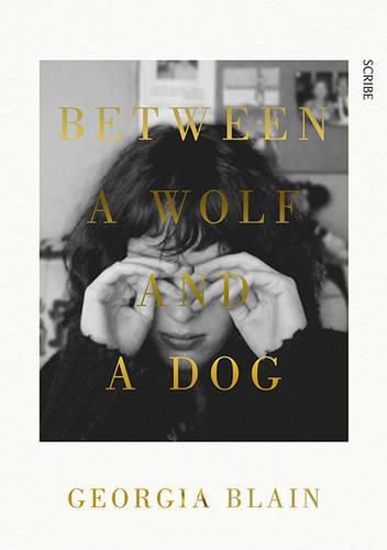 Cover image for Between a Wolf and a Dog