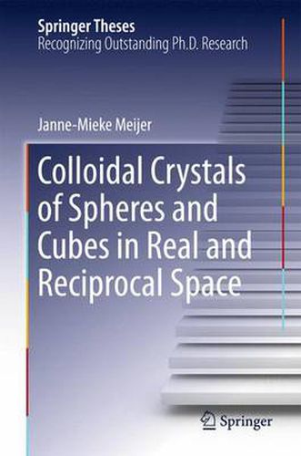 Colloidal Crystals of Spheres and Cubes in Real and Reciprocal Space