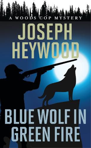 Cover image for Blue Wolf in Green Fire: A Woods Cop Mystery