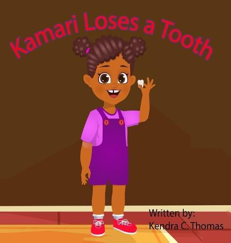 Kamari Loses a Tooth