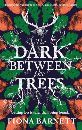 Cover image for The Dark Between The Trees