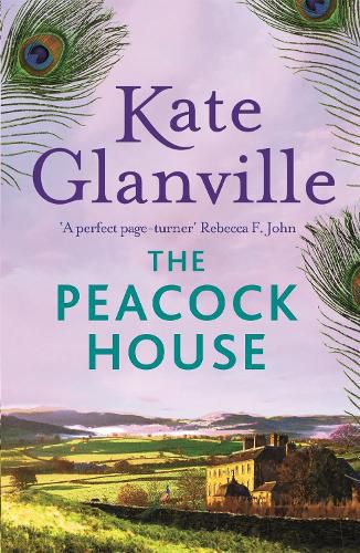 Cover image for The Peacock House: Escape to the stunning scenery of North Wales in this poignant and heartwarming tale of love and family secrets